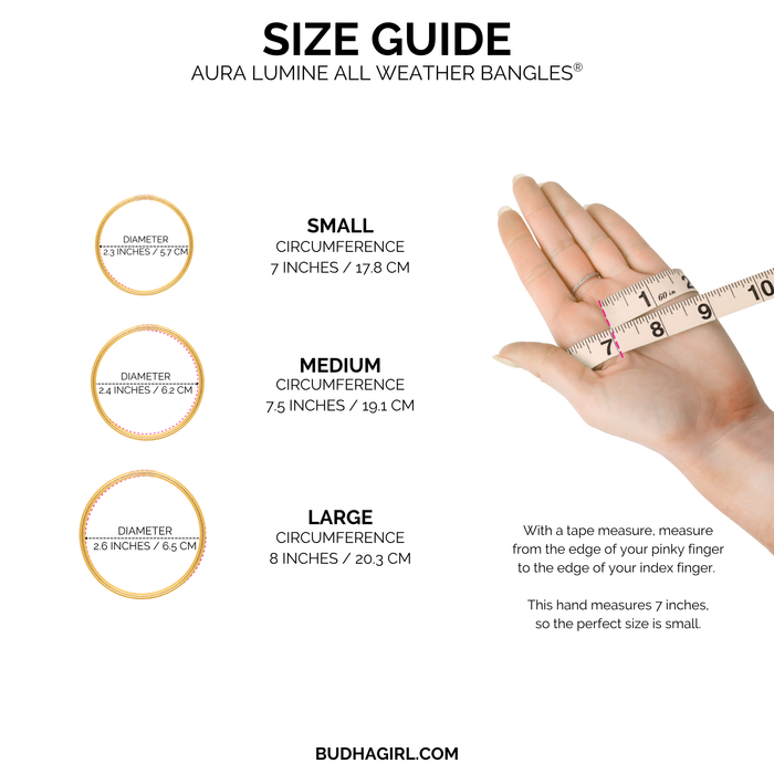 a hand holding a measuring tape