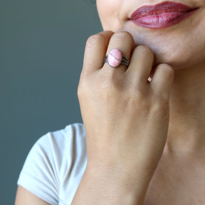 sheila of satin crystals wearing a rhodochrosite gemstone in gunmetal ring