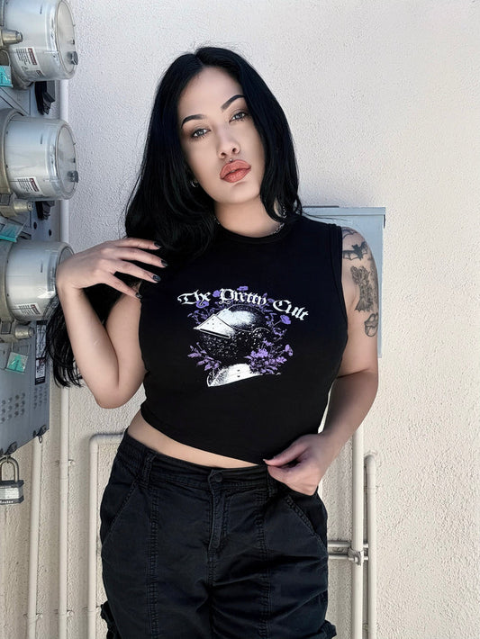 Model wearing the Floral Helm Crop by The Pretty Cult, black cotton graphic crop top