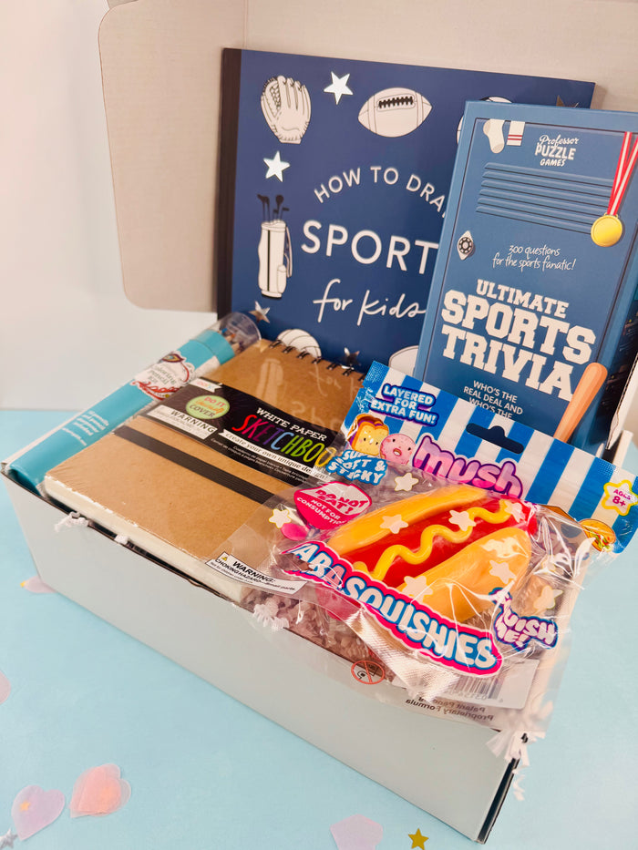 Educational and snack items including books and snacks on a light blue surface.