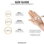 a hand holding a measuring tape