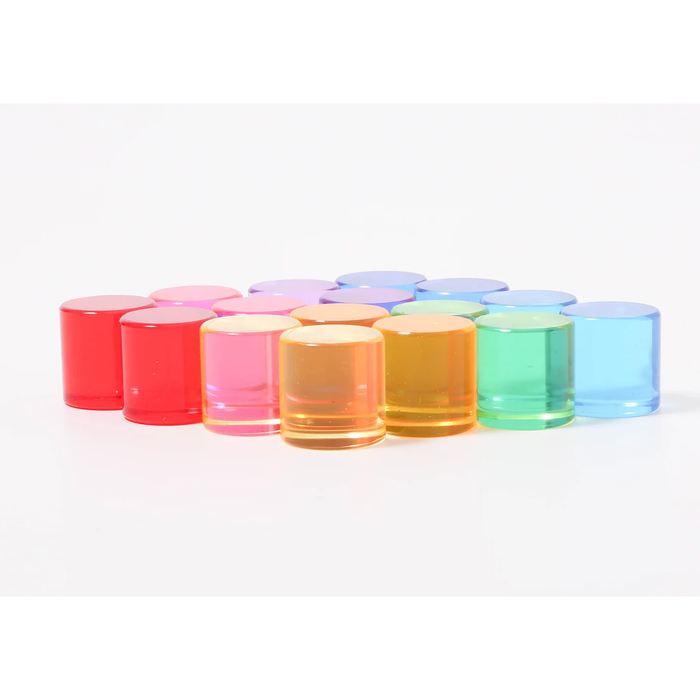 Set of colorful glass containers on a white background