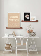 Bewitched is an typography and illustration of the words 'Good Witch' and 'but don't mess with me' on a folded beige paper by Audrey Rivet in collaboration with Opposite Wall.