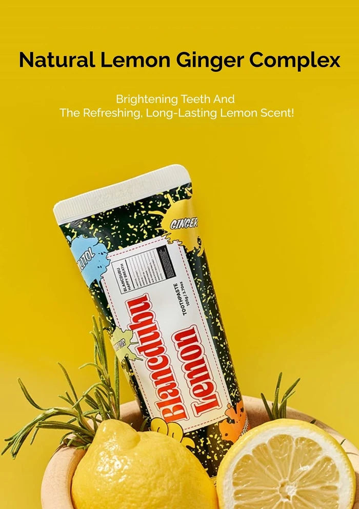 Blondie Lemon toothpaste with lemons and ginger on a yellow background