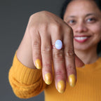sheila of satin crystals wearing a blue lace agate oval copper adjustable ring