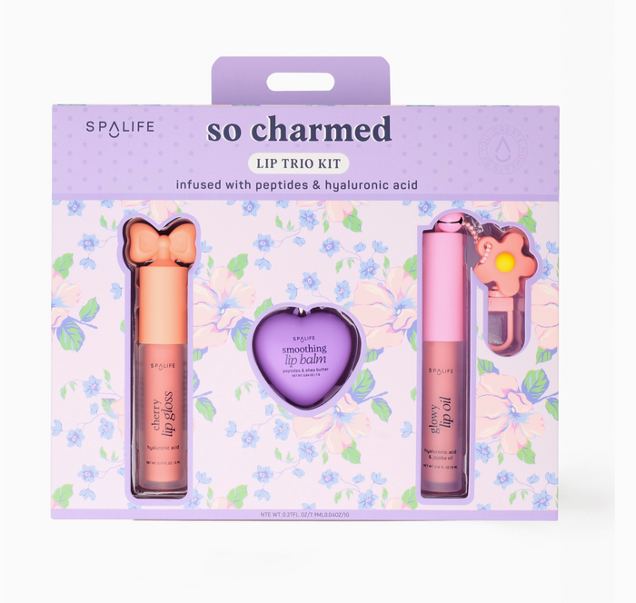 Spalife lip trio kit packaging with lip gloss, balm, and spatula on a floral background