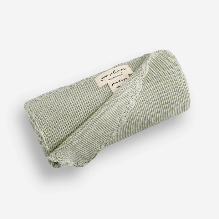 Cotton Knit Blanket in Sage Green with scallop trim detail, rolled