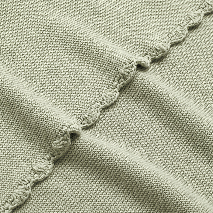 Cotton Knit Blanket in Sage Green with scallop trim detail up close shot