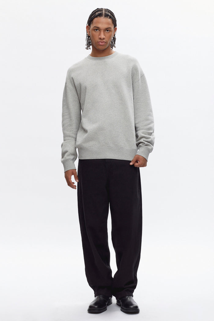 Ethan is 6ft 3in, a regular size M and wearing an L.