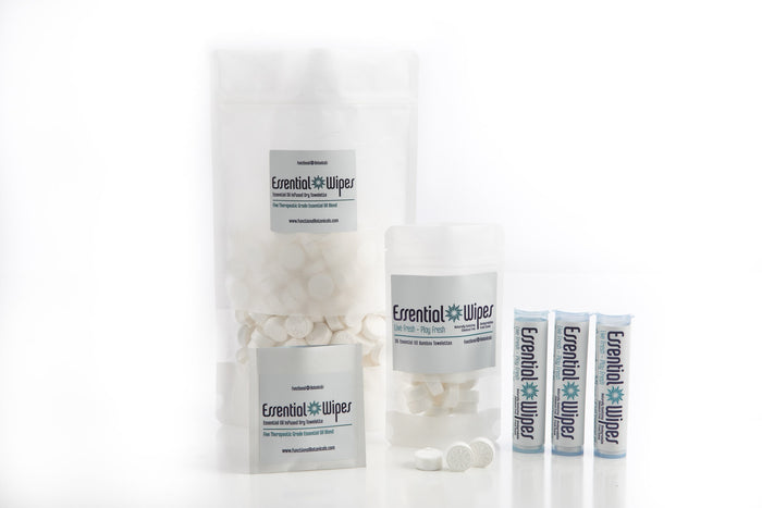 Various containers and tubes of Essential Wipes Plus PRO Pak - 350 qty | Functional Botanicals arranged on a white surface, showcasing the product packaging for skincare and wellness.