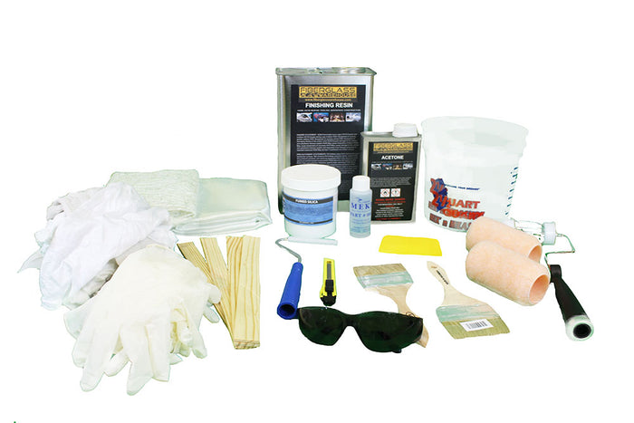 Fiberglass Warehouse gallon fiberglass and resin repair kit that includes- chopped strand mat, fiberglass cloth, finishing polyester resin, mixing cups,gloves, stir sticks, chip brushes, safety glasses, laminating roller, MEKP, fumed silica, squeegee, roller covers and acetone.