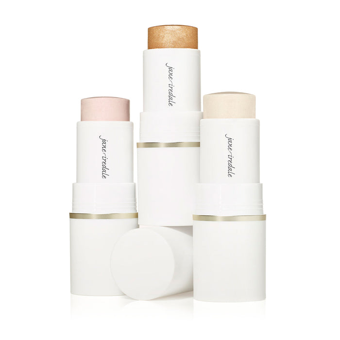 Three Glow Time Highlighter Stick | Jane Iredale makeup sticks in white tubes with gold, pink, and ivory shades, designed to add radiant glow to the skin.