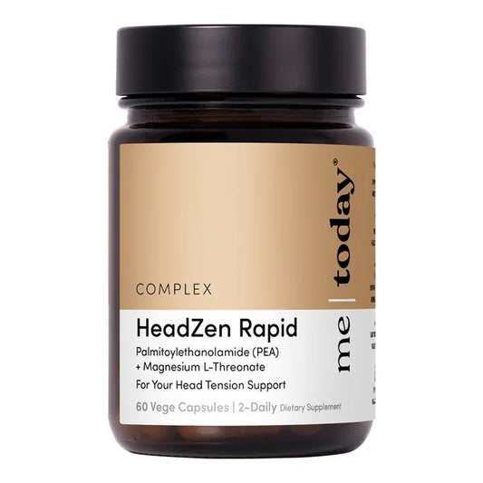 A dark amber bottle of HeadZen Rapid supplement with a black cap and a beige and white label.