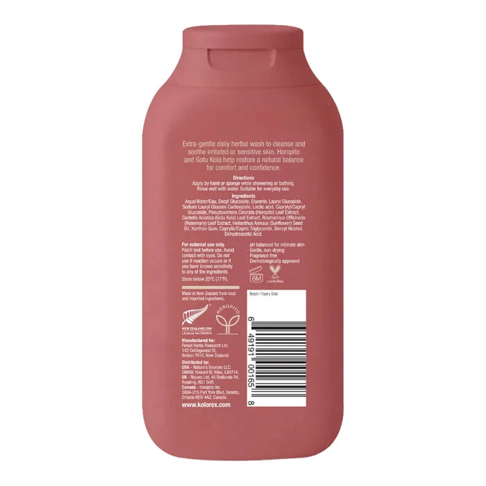 Back view of pink bottle of herbal intimate wash showing ingredients & directions.