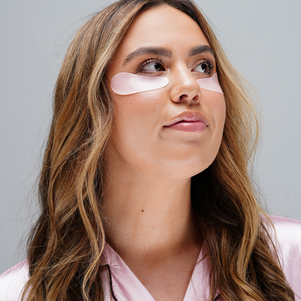 Woman wearing Hydrating Reusable Under Eye Patches | Dreambox Beauty in a skincare routine, promoting hydration and wellness for the under-eye area.