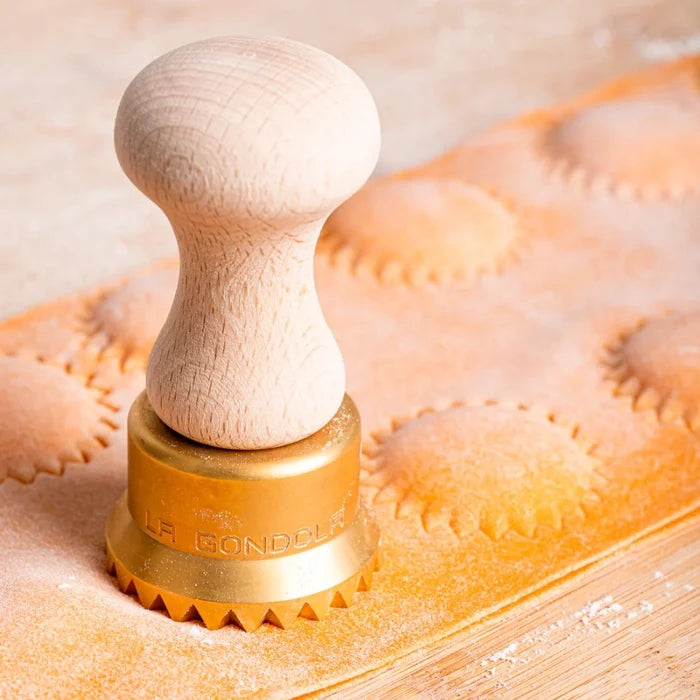 Pasta stamp on a bed of fresh pasta