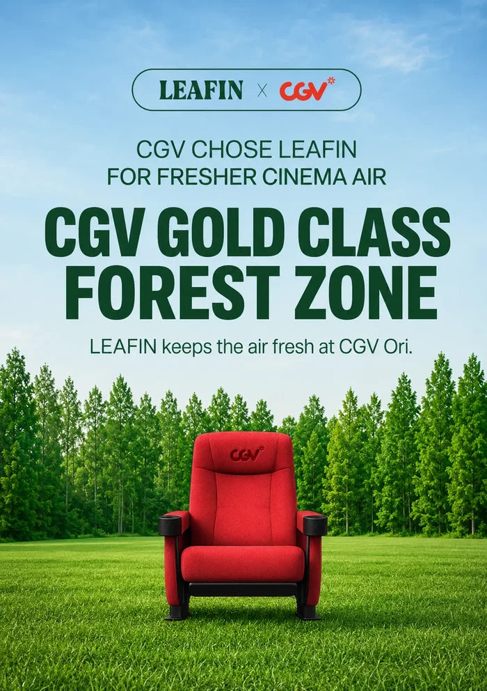 A promotional graphic for the LEAFIN x CGV Forest Zone cinema seat, featuring a red upholstered movie chair with black armrests set against a lush green forest and grass background under a blue sky. Large text reads 'CGV GOLD CLASS FOREST ZONE' with LEAFIN and CGV branding at the top.