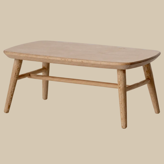 Wooden coffee table on a white background