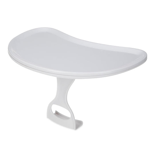 The My Floor Seat Activity Tray is a white plastic, kidney-bean-shaped tray with raised edges. It features an ergonomic support post with a secure latch base and is designed for use with the My Floor Seat to provide comfortable baby seating.