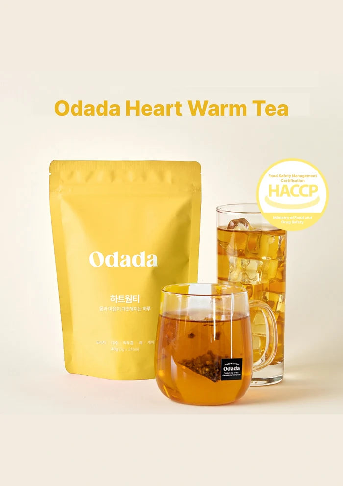 Odada Heart Warm Tea packaging with a glass of tea on a light background