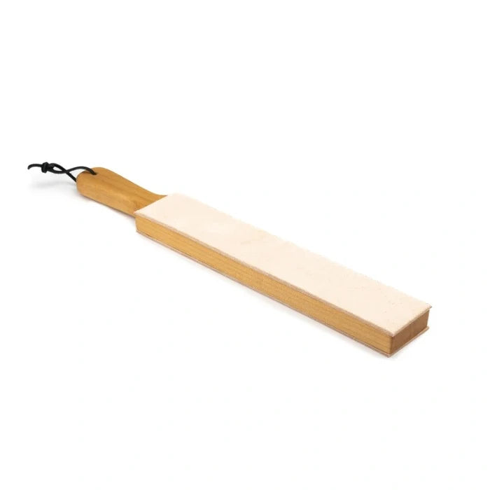 Wooden paddle with a white leather surface on a white background.