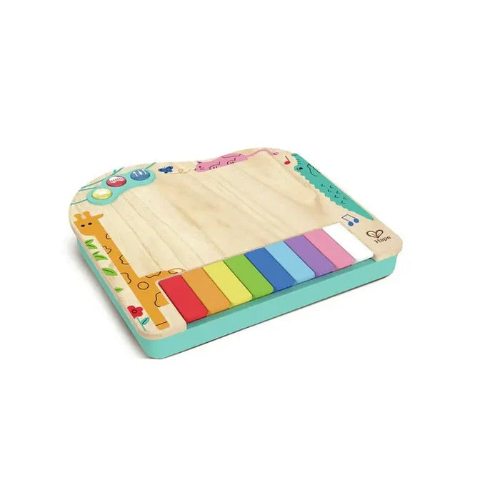 Colorful wooden toy piano with rainbow keys on a white background