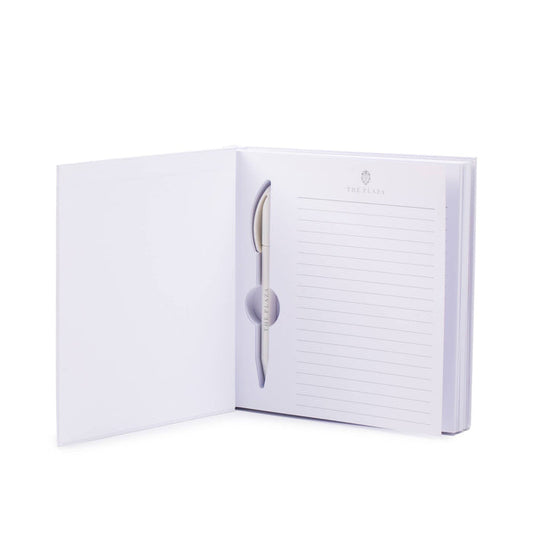 Plaza Hotel white leather penbook open showing interior on a white background
