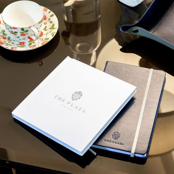 Plaza Hotel white penbook lifestyle shot on desk