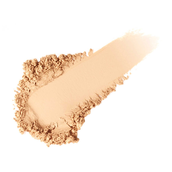 Swatch of a light golden powder texture for Powder-Me SPF Sunscreen SPF 30 | Jane Iredale, showcasing its smooth, finely milled skincare formula.