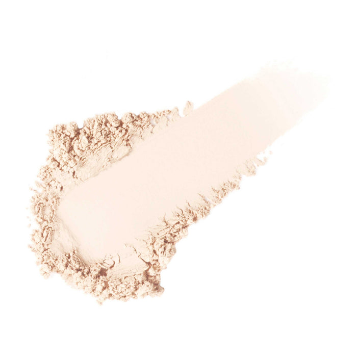Smoothed translucent beige powder swatch representing the Powder-Me SPF Sunscreen SPF 30 | Jane Iredale, highlighting skincare and sun protection features.