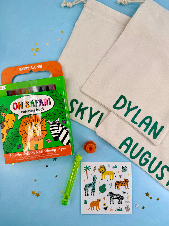 Coloring book, stickers, and personalized bags on a blue background