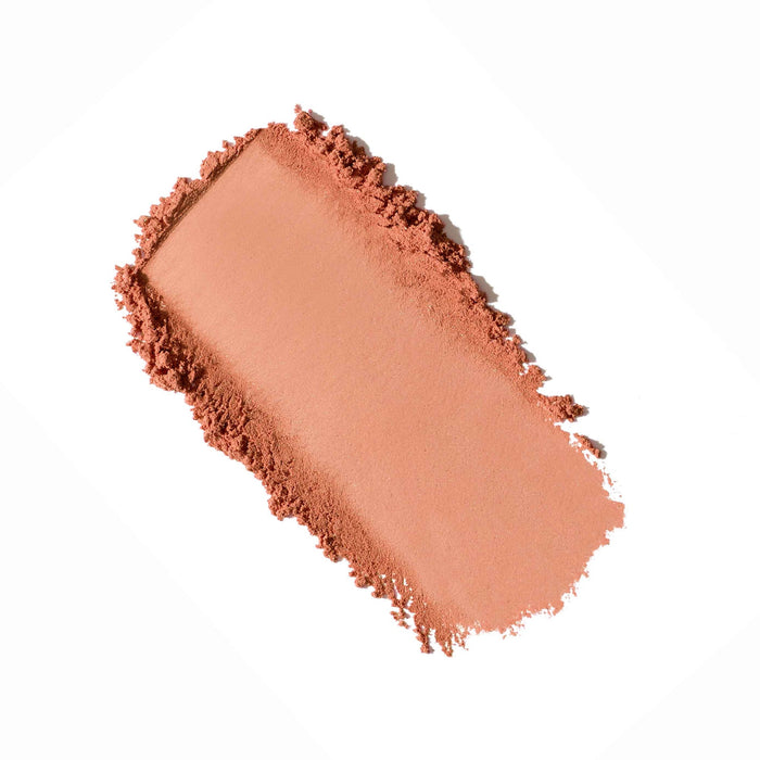 Soft copper-toned powder swatch of Purepressed Blush | Jane Iredale showcasing a smooth, finely milled texture for a natural makeup finish.
