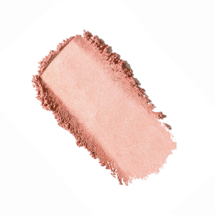 Soft pink powder swatch of Purepressed Blush | Jane Iredale on a white background, highlighting its smooth texture and natural finish for skincare and beauty routines.