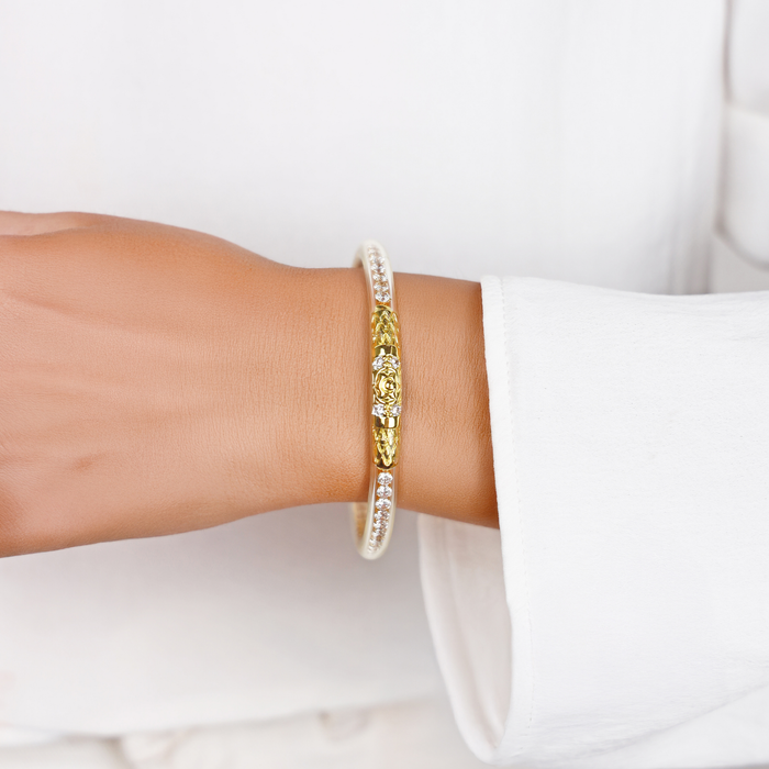 a close up of a bracelet on a wrist