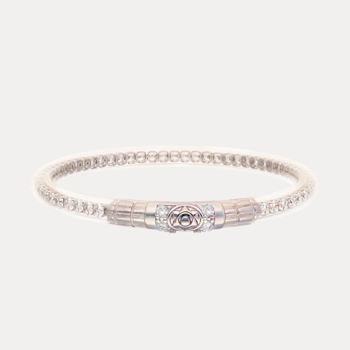 a silver bracelet with diamonds