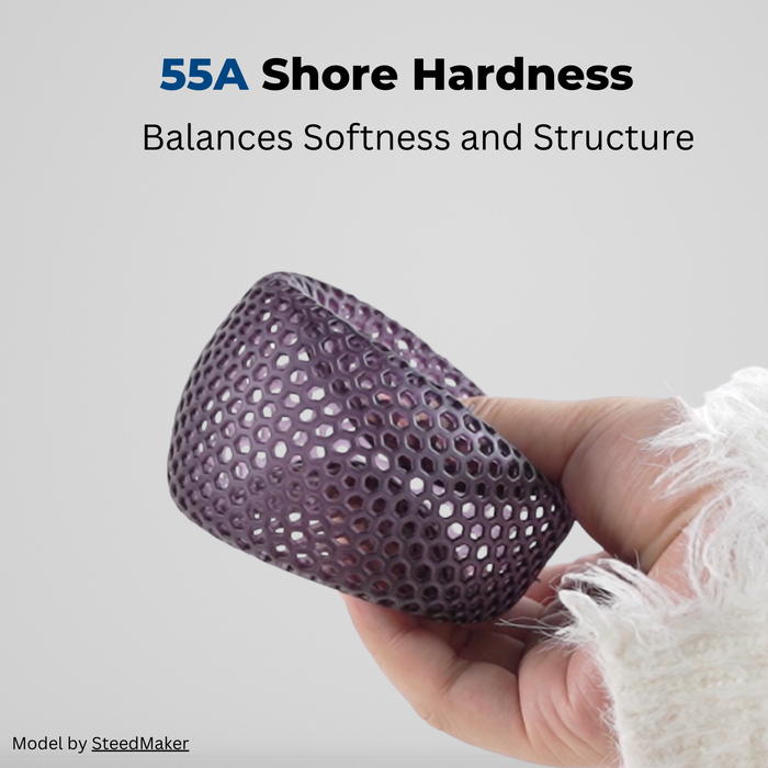 elastic resin 55A 3D printed flexible lattice honeycomb cup held in hand showing stretch