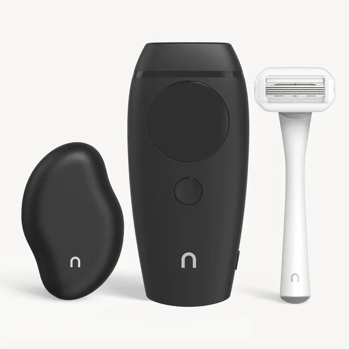 Nood Tool Kit in black including black Eraser exfoliating tool, Flasher 2.0 IPL device in matte black, and white razor on light background